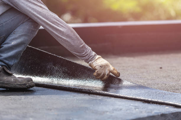 Professional Basement Waterproofing technician working in Fremont, OH